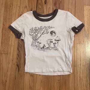 Tan Shirt with a Mystical Graphic